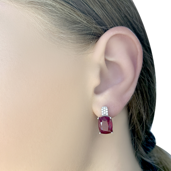 Silver earrings with a ruby