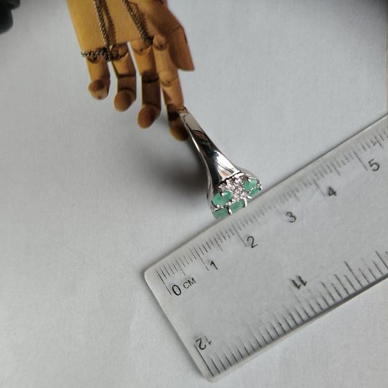 Silver ring with emerald, fianites