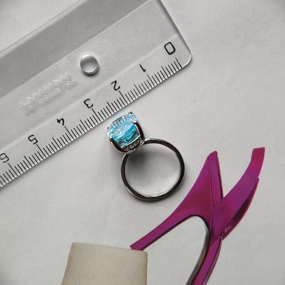 Silver ring with topaz