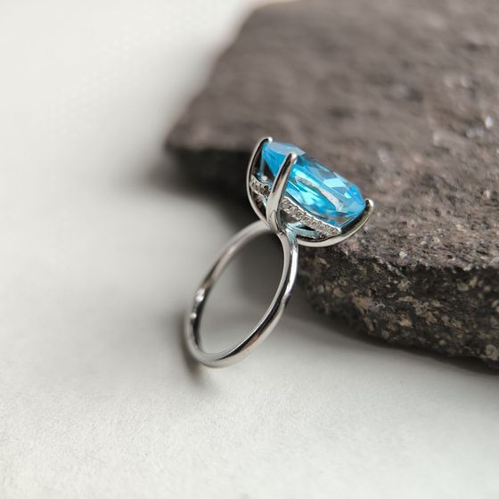 Silver ring with topaz