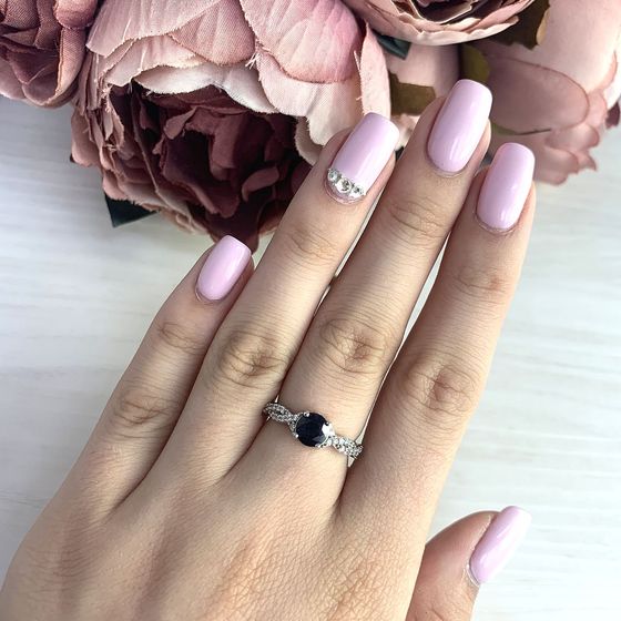 Silver ring with a sapphire