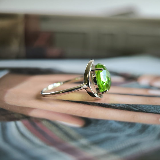 Silver ring with a 3.287-carat chrysolite