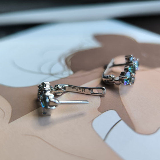 Silver earrings with a 1.42-carat mystic topaz