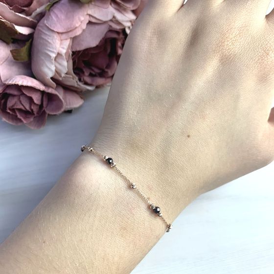 Золотий браслет зі шпінеллю