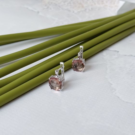 Silver earrings with 5.575 ct sultanaite