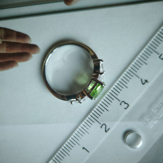 Silver ring with a 1.573-carat chrysolite and cubic zirconia