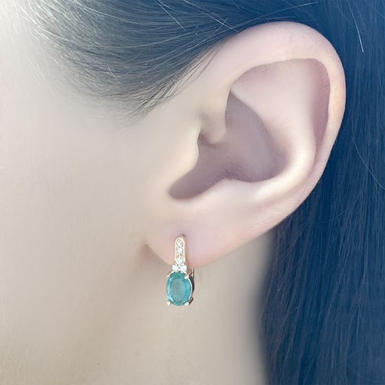 Золотые серьги с изумрудом