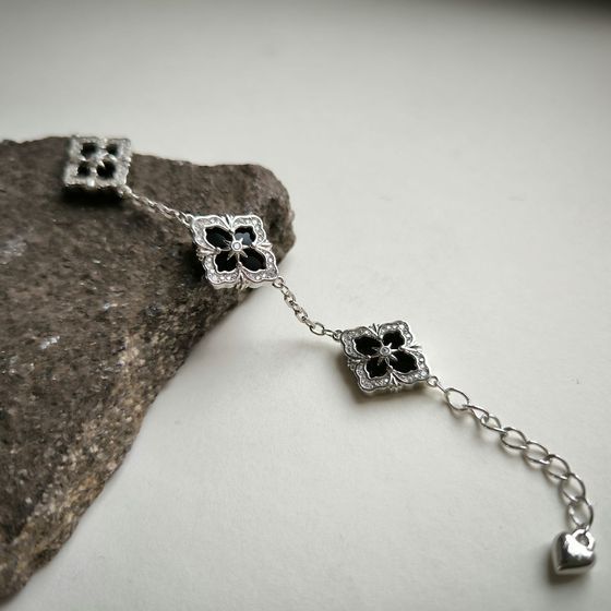 Silver bracelet with onyx, fianites