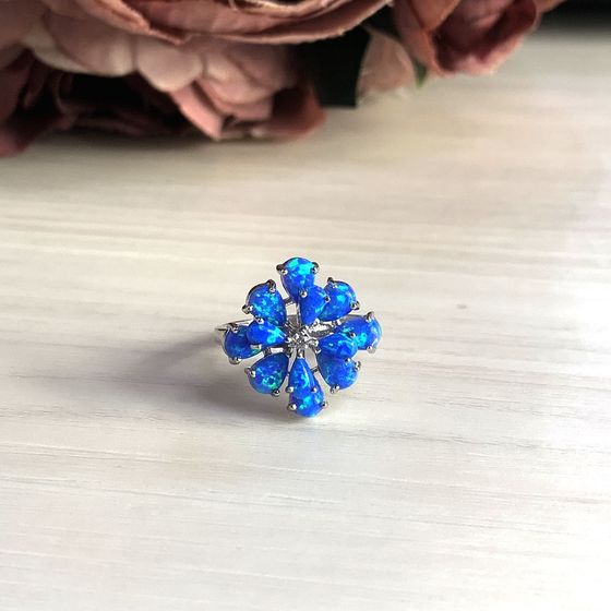Silver ring with an opal
