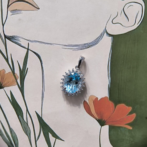 Срібна підвіска з топазом 3.265ct, фіанітами