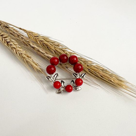 Silver brooch with coral