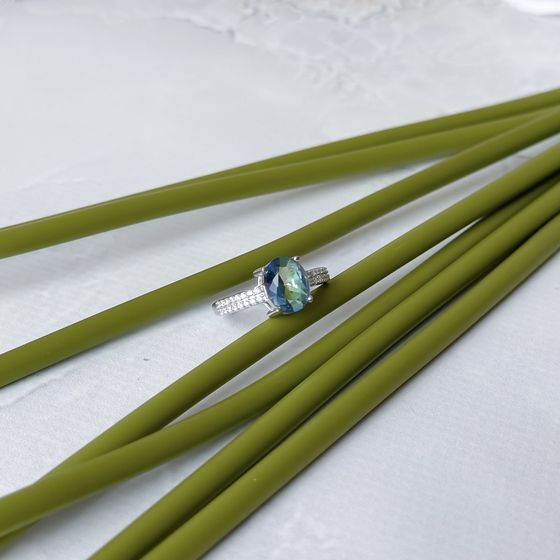 Silver ring with a mystic topaz