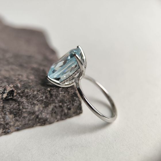 Silver ring with topaz