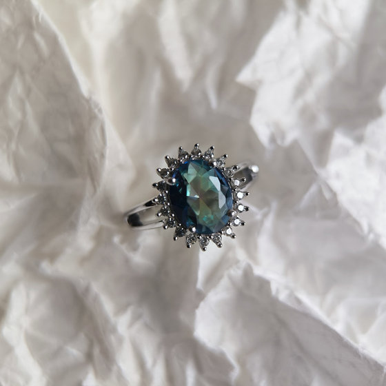 Silver ring with mystic topaz