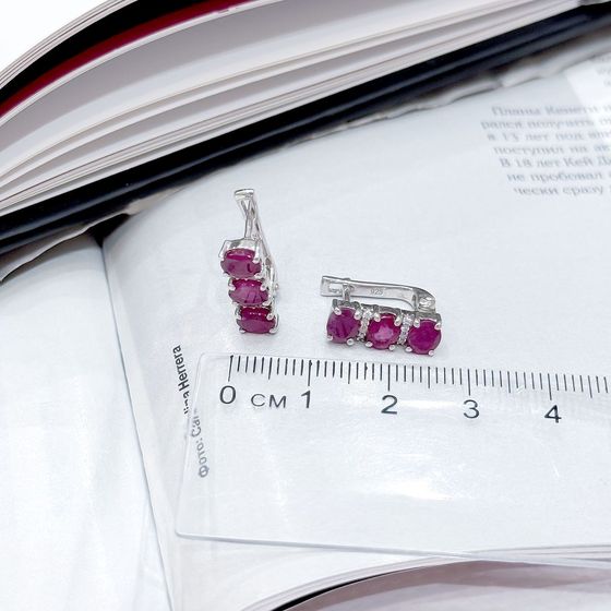 Silver earrings with a ruby and cubic zirconia