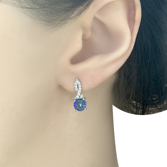 Silver earrings with a 1.509-carat mystic topaz