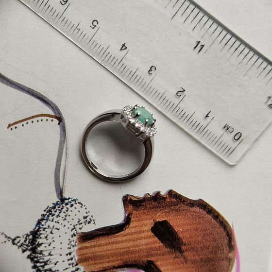 Silver ring with emerald, fianites