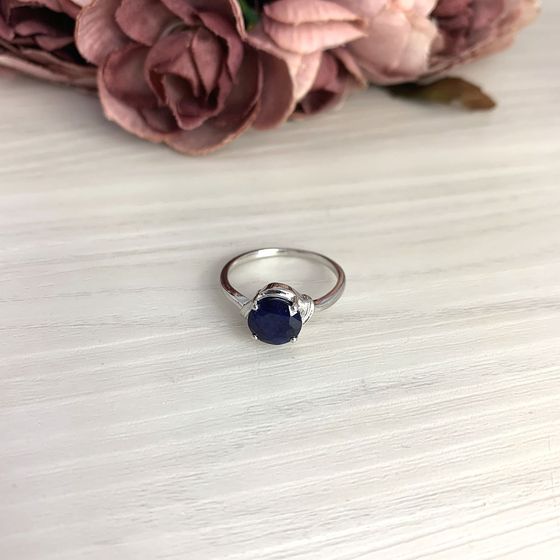 Silver ring with a sapphire