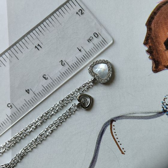 Silver necklace with mother-of-pearl, phianites