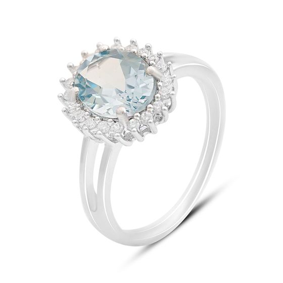 Срібна каблучка з топазом 3,265 карата та фіанітами