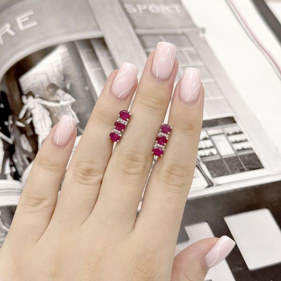Silver earrings with a ruby and cubic zirconia