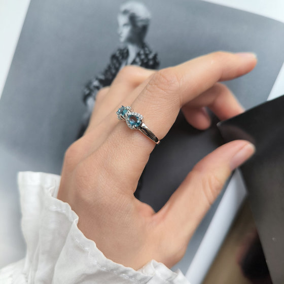 Silver ring with London Blue topaz and cubic zirconia