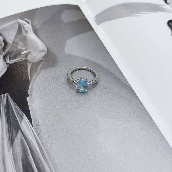 Silver ring with a topaz