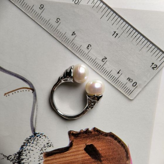 Silver ring with baroque pearls
