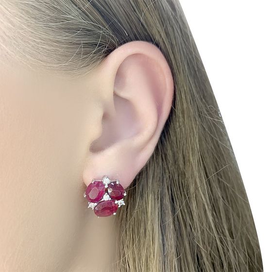 Silver earrings with a ruby