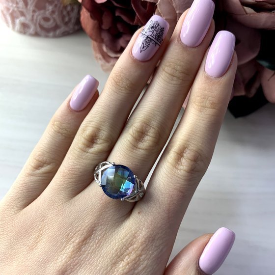 Silver ring with mystic topaz