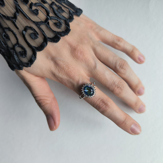 Silver ring with mystic topaz