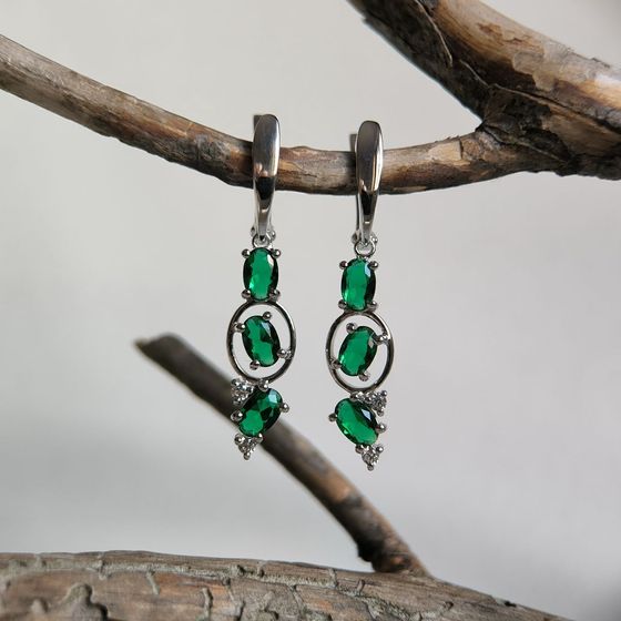 Silver earrings with a 2.338-carat nano emerald