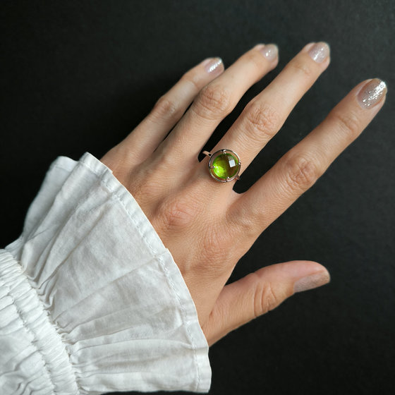Silver ring with a 3.287-carat chrysolite