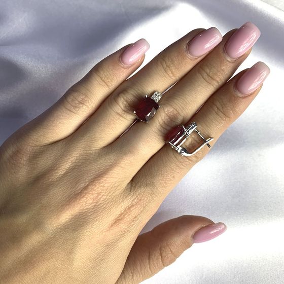Silver earrings with a ruby