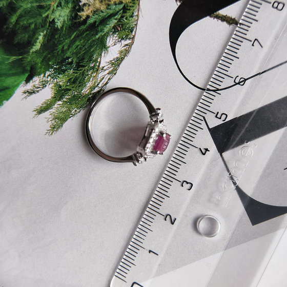 Silver ring with ruby and cubic zirconia