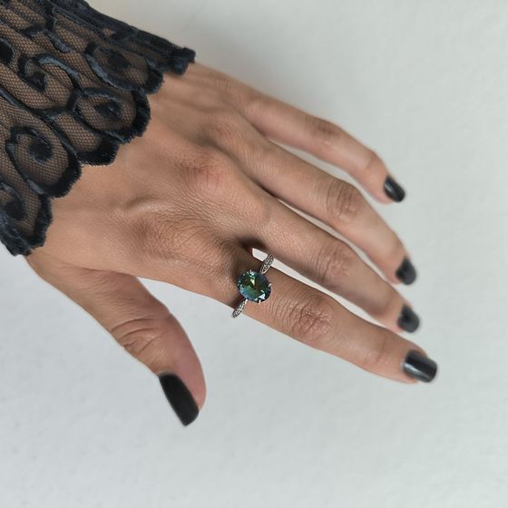 Silver ring with mystic topaz