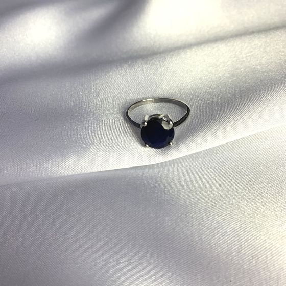 Silver ring with a sapphire