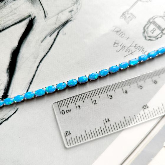 Silver bracelet with opal