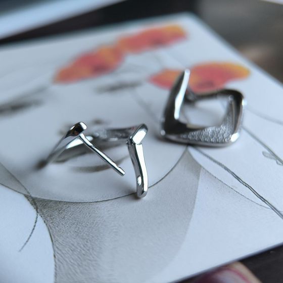 Срібні сережки з фіанітами