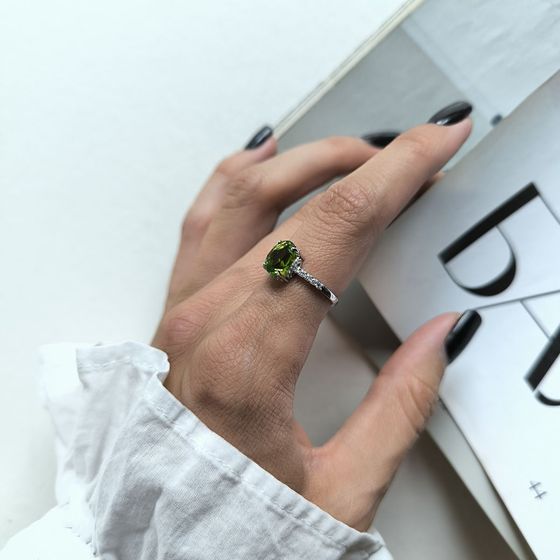 Silver ring with chrysolite