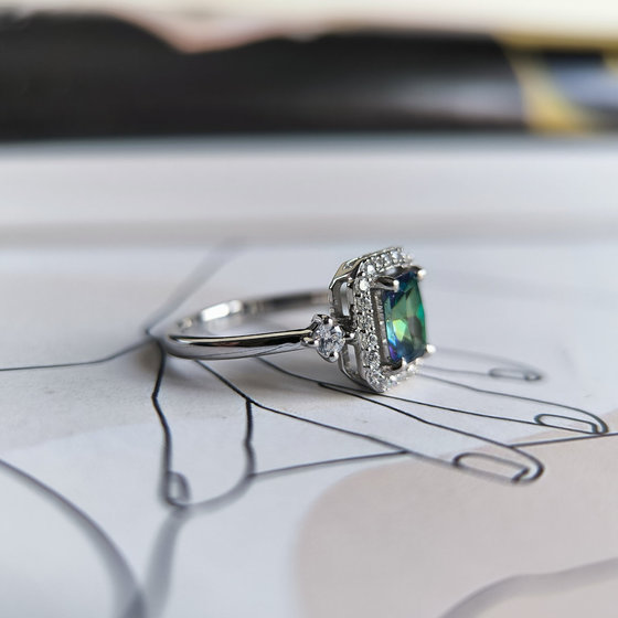 Silver ring with mystic topaz