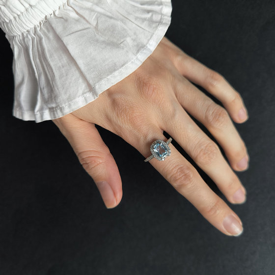 Срібні сережки з топазом 4.307ct, фіанітами