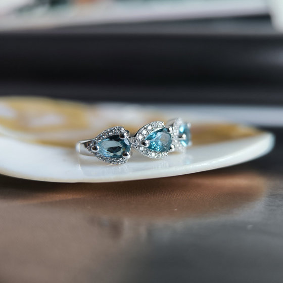 Silver ring with London Blue topaz and cubic zirconia