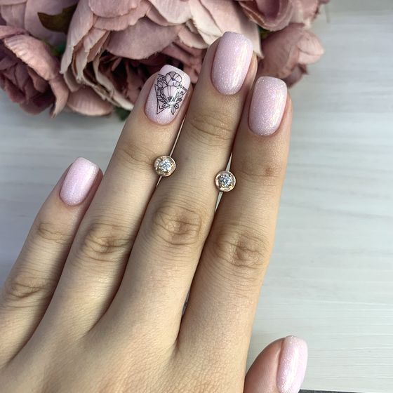 Золоті сережки з діамантом 0.22ct