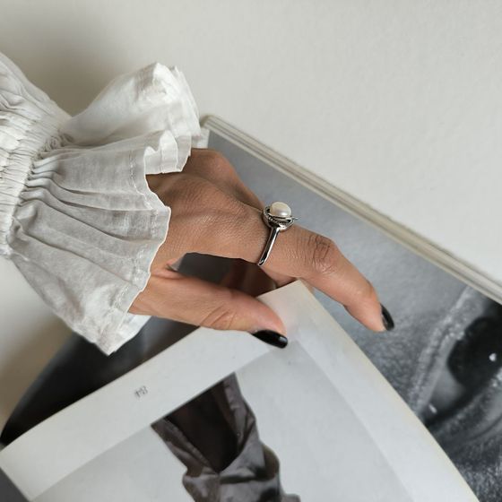 Silver ring with pearls