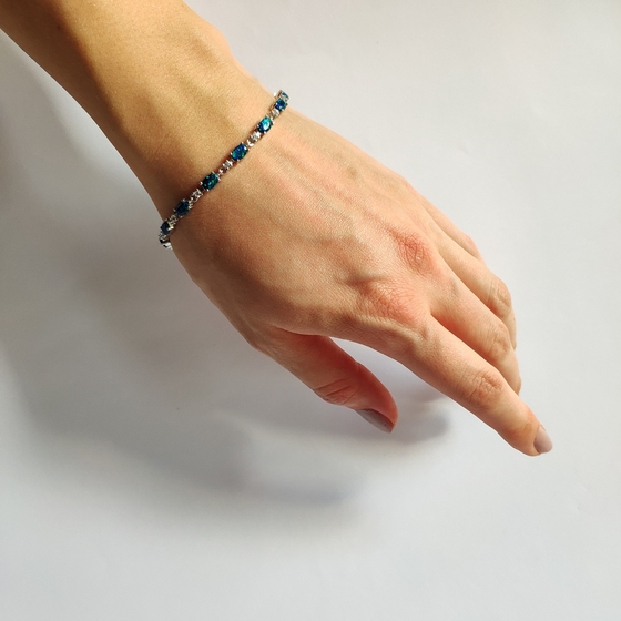 Silver bracelet with opal, fianites