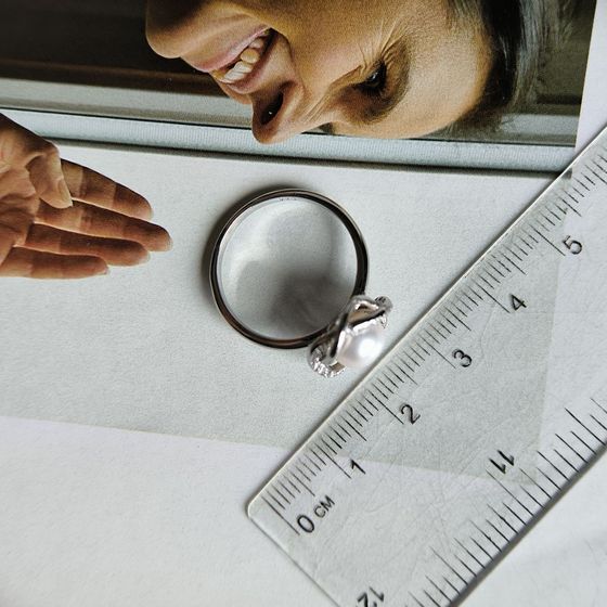 Silver ring with pearls