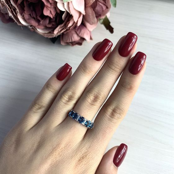 Срібна каблучка з топазом «Лондон Блю»