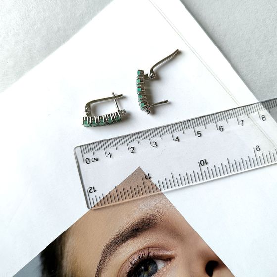 Silver earrings with emerald, fianites