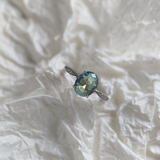 Silver ring with mystic topaz